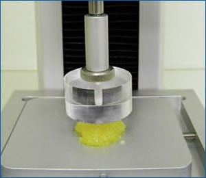 Caviar softness testing with a compression fixture