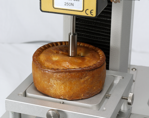 Pork pie penetration testing at the centre of the pastry crust